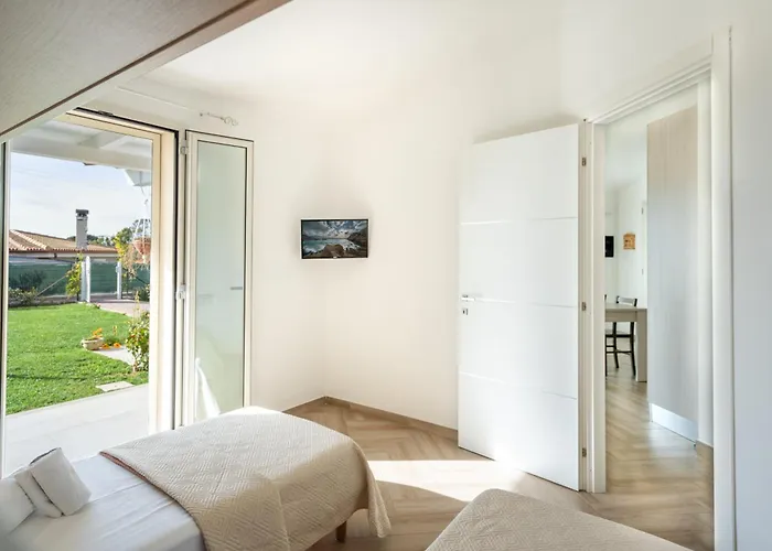 Li Junchi - Due Passi Dal Mare - Spazioso Giardino Vakantiehuis Badesi